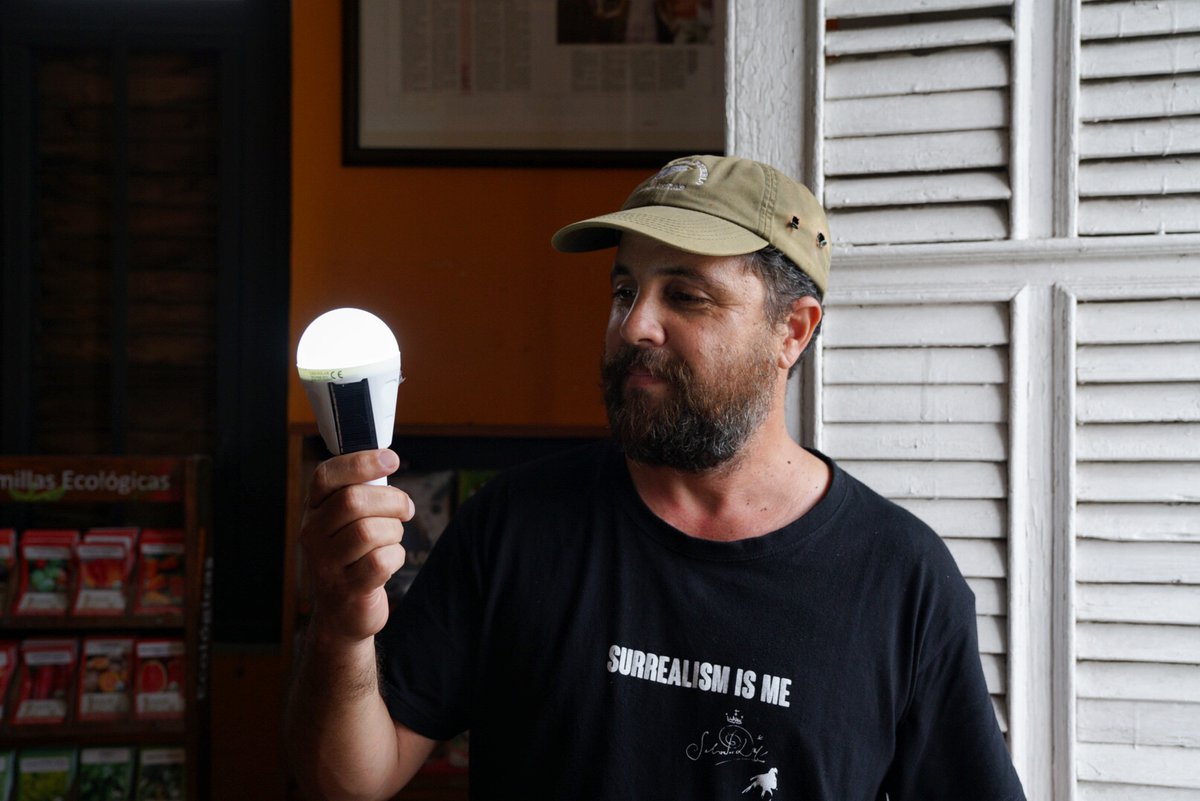 With the power out in Adjuntas, Puerto Ricans rely on the sun to light their community at night