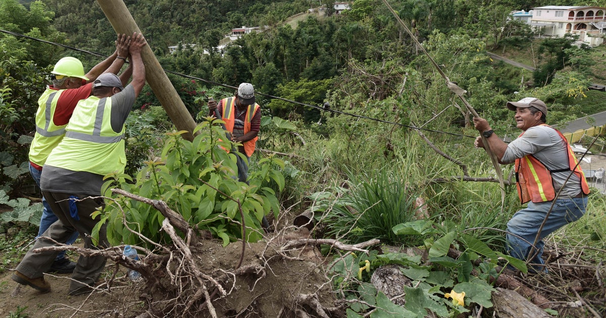 "Desperation set in": Puerto Ricans grab shovels, machetes to help restore power
